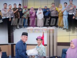 Polres Banggai Bagikan Bansos dalam Rangka Hari Bhayangkara Ke-78 di Aula Rupatama