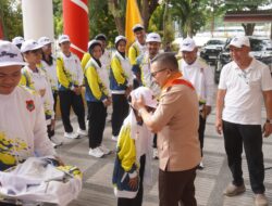 Bupati Banggai Banggai H. Amirudin Resmi Melepas Kontingen POPDA XXIII Tahun 2025 Kabupaten Banggai di Palu