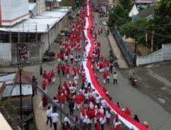 Semarak Hari Kemerdekaan, Panitia HUT RI ke-80 Pemkab Banggai Gelar Kirab Dengan Bentangkan Bendera Merah Putih Sepanjang 1 Kilo Meter
